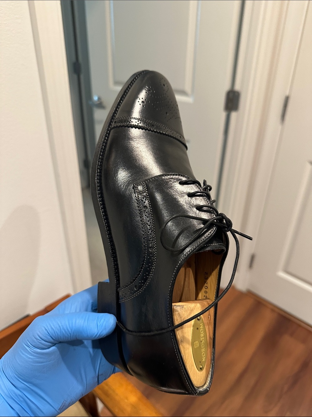 Santoni dress shoes feature a distinct toe medallion. - Picture 12 of 14
